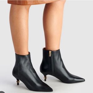 Never worn Coach Reserve Jewel boots